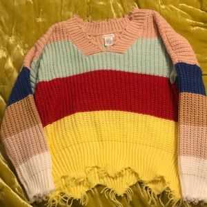 boutique colorful sweater with distressed trim